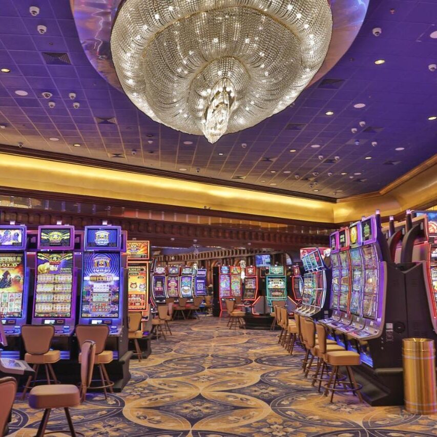 A room filled with lots of slot machines.