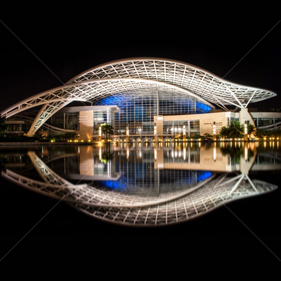 A building with a reflection of the sky in it.
